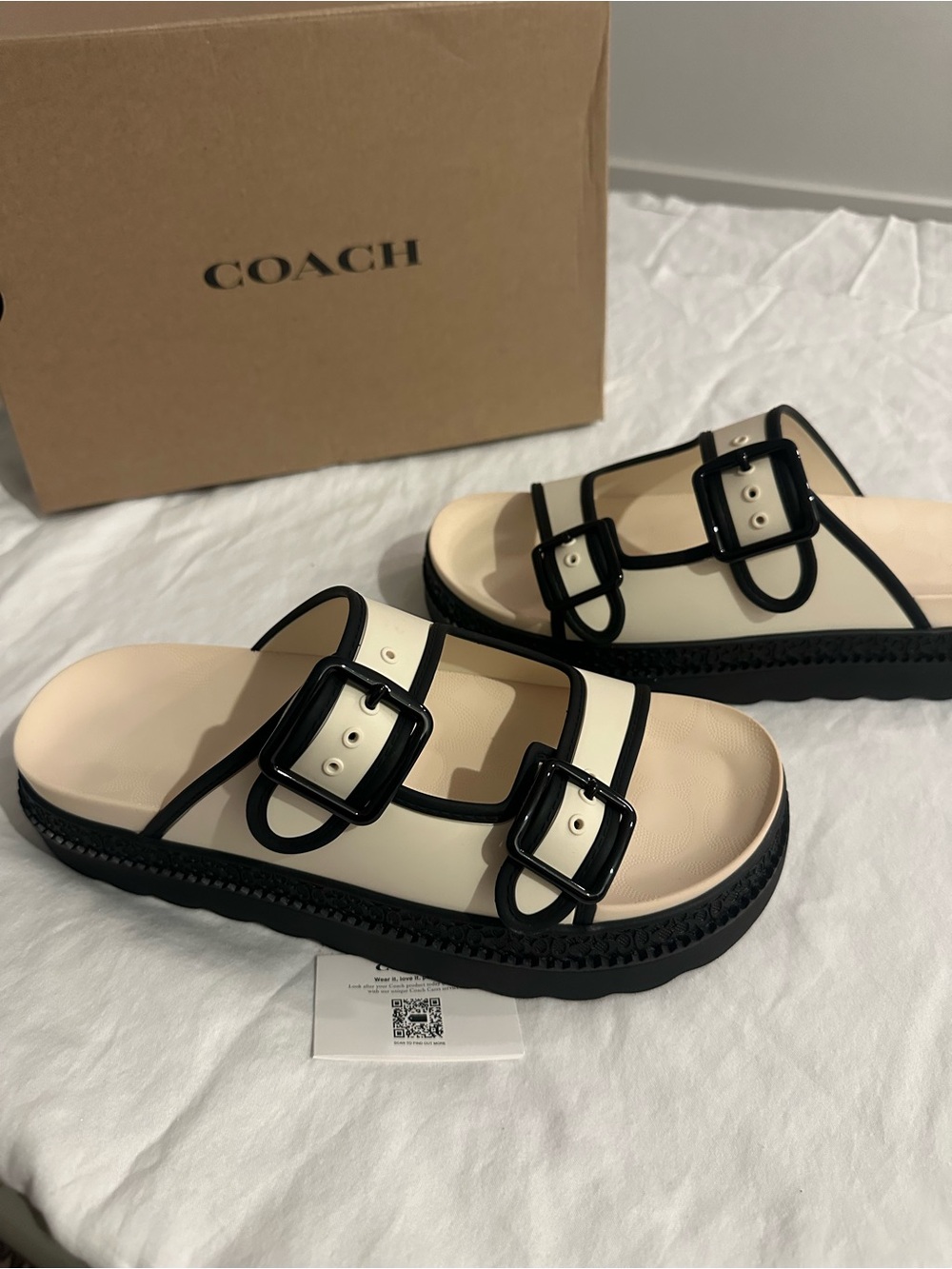 Coach Two-Buckle Slide Sandals in Cream and Black Trim